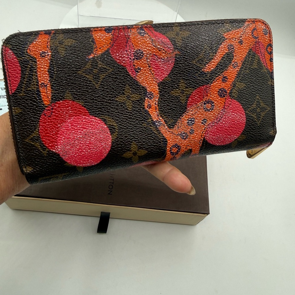 Louis Vuitton Monogram Ramage zippy wallet limited edition full inclusion w/COA